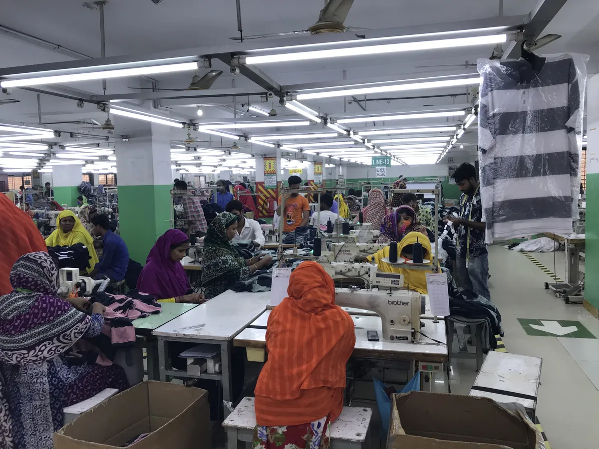 Busy sewing line with skilled operators