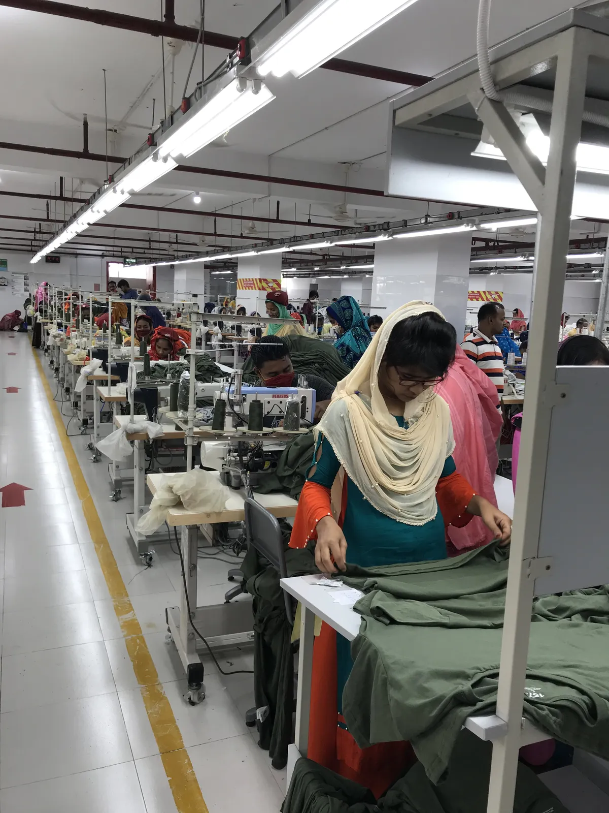 Skilled sewing-machine operator at work