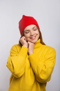 happy-young-woman-red-knitted-hat_74855-5084