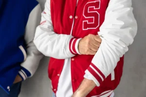 men-wearing-varsity-jacket_23-2149562624