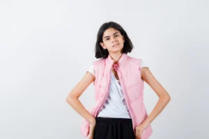 portrait-little-girl-white-t-shirt-puffer-vest_176474-19089
